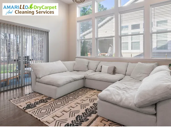 Freshly cleaned area rug and white sectional sofa by Amarillo Dry Carpet and Cleaning Services