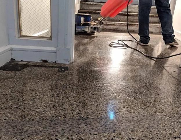 Amarillo technician restoring terrazzo floor in commercial building